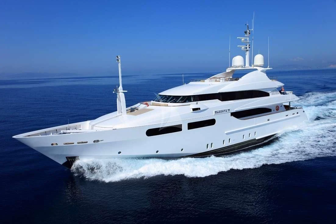 a white yacht on the water aboard TITIAN PEARL Yacht for Sale