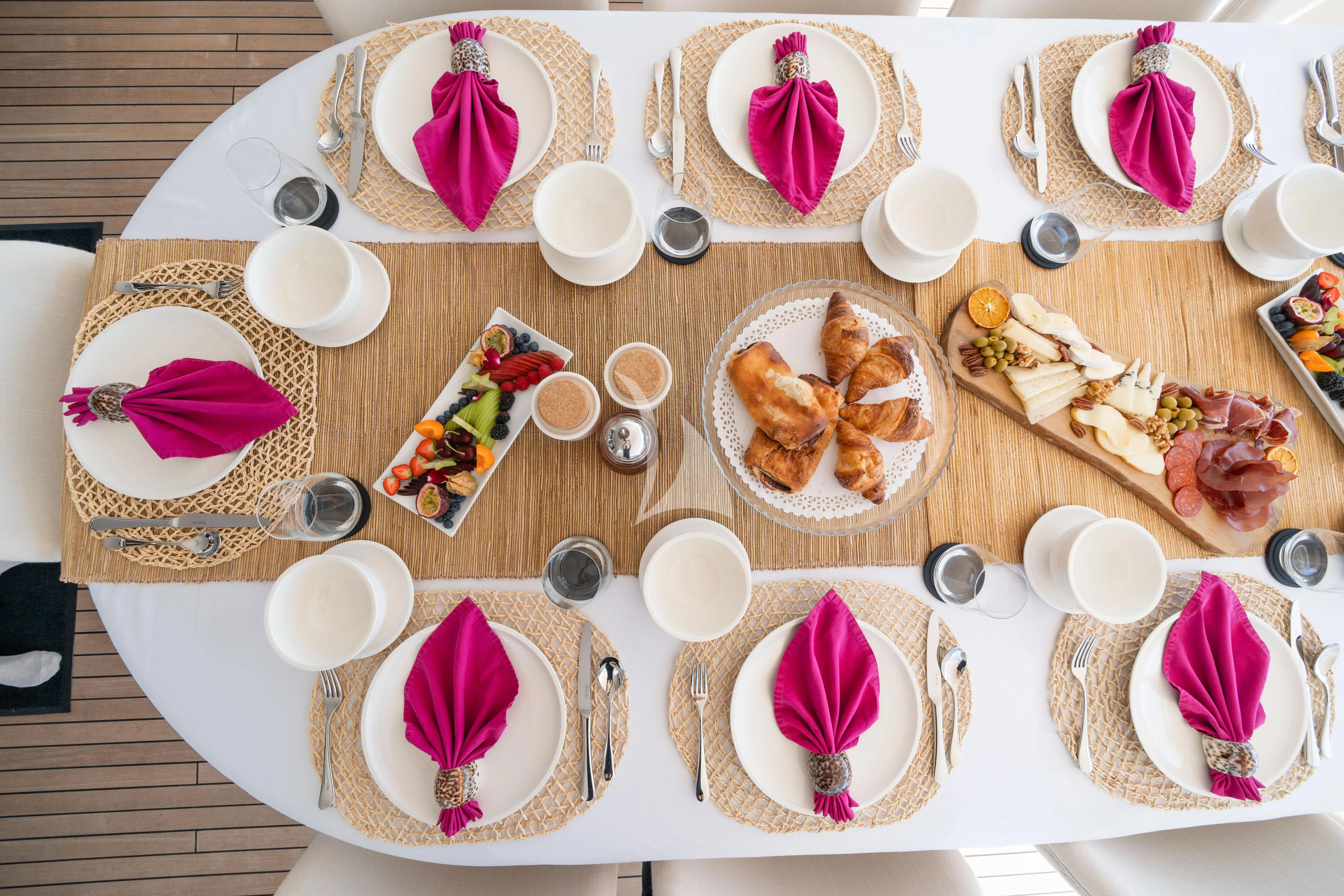 a table full of food aboard TITIAN PEARL Yacht for Sale