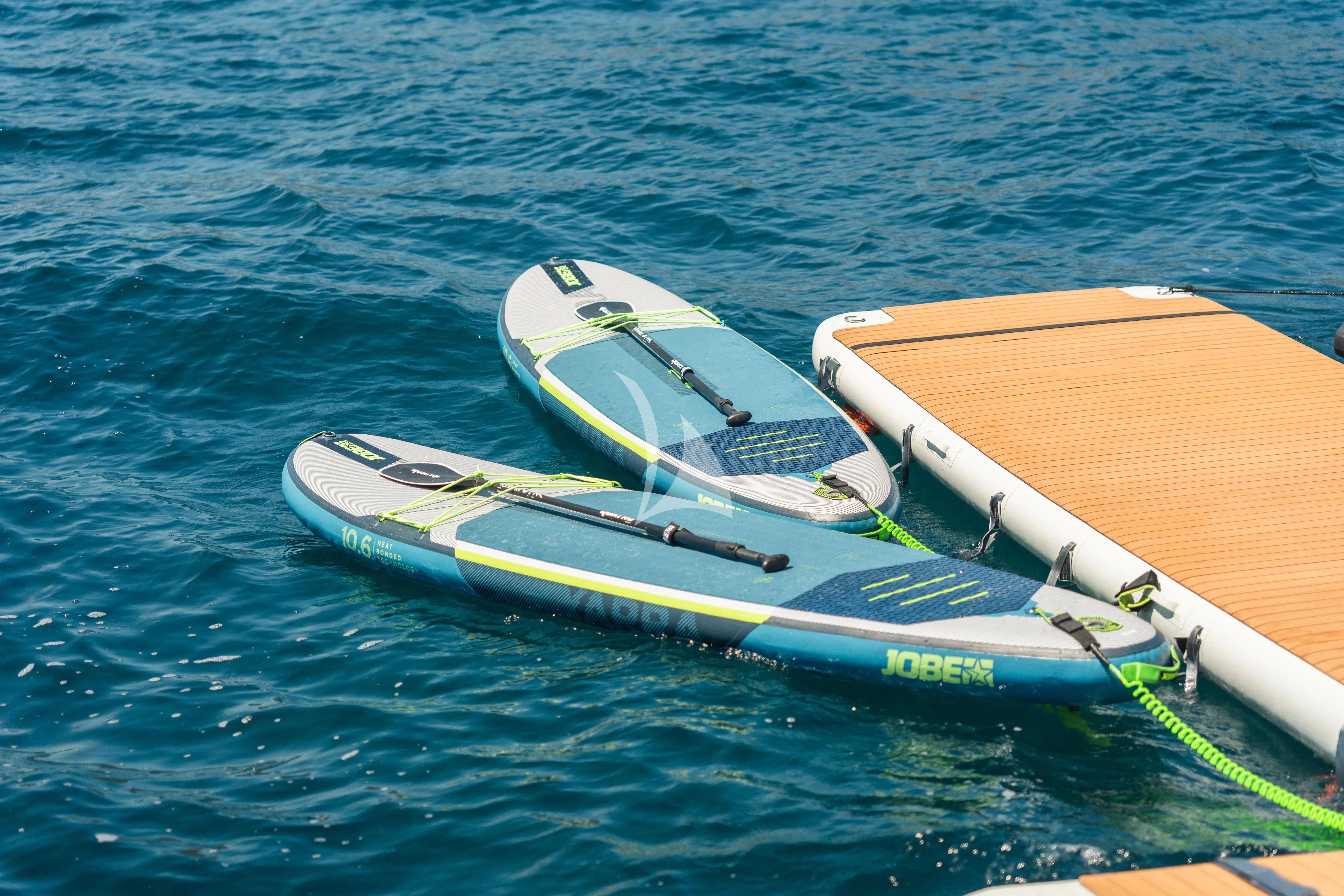 a boat in the water aboard TITIAN PEARL Yacht for Sale