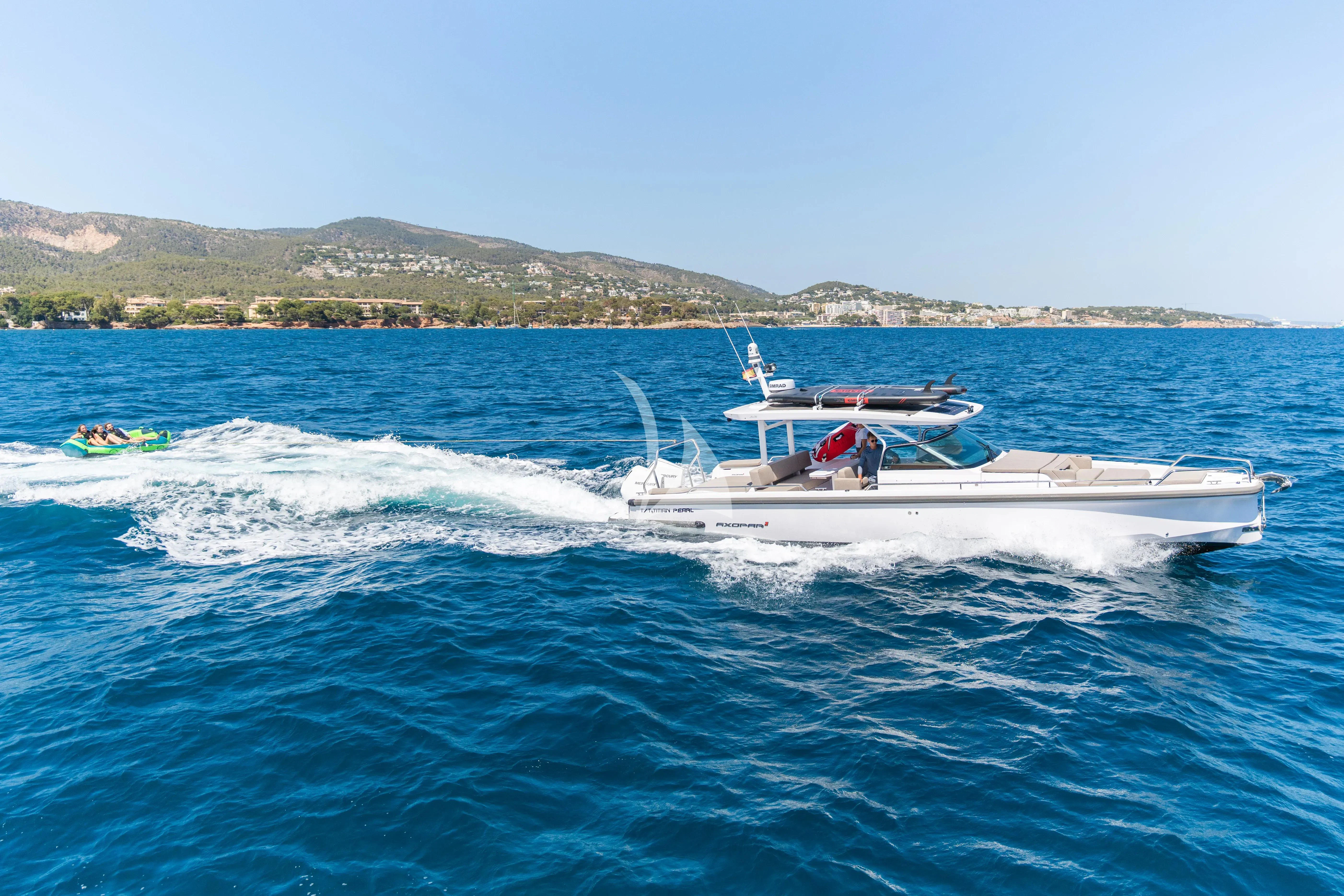 a boat on the water aboard TITIAN PEARL Yacht for Sale
