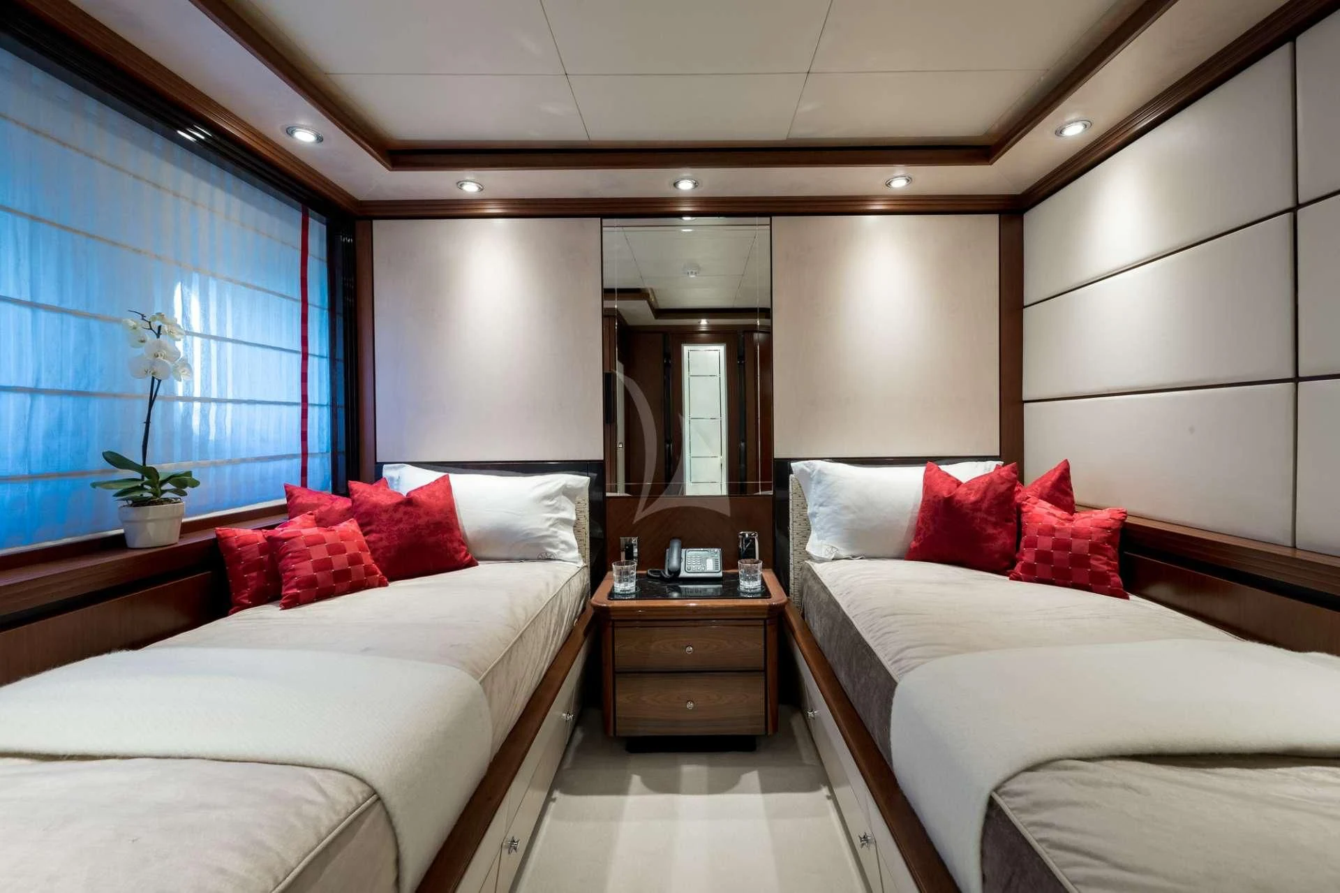 a room with two beds aboard TITIAN PEARL Yacht for Sale