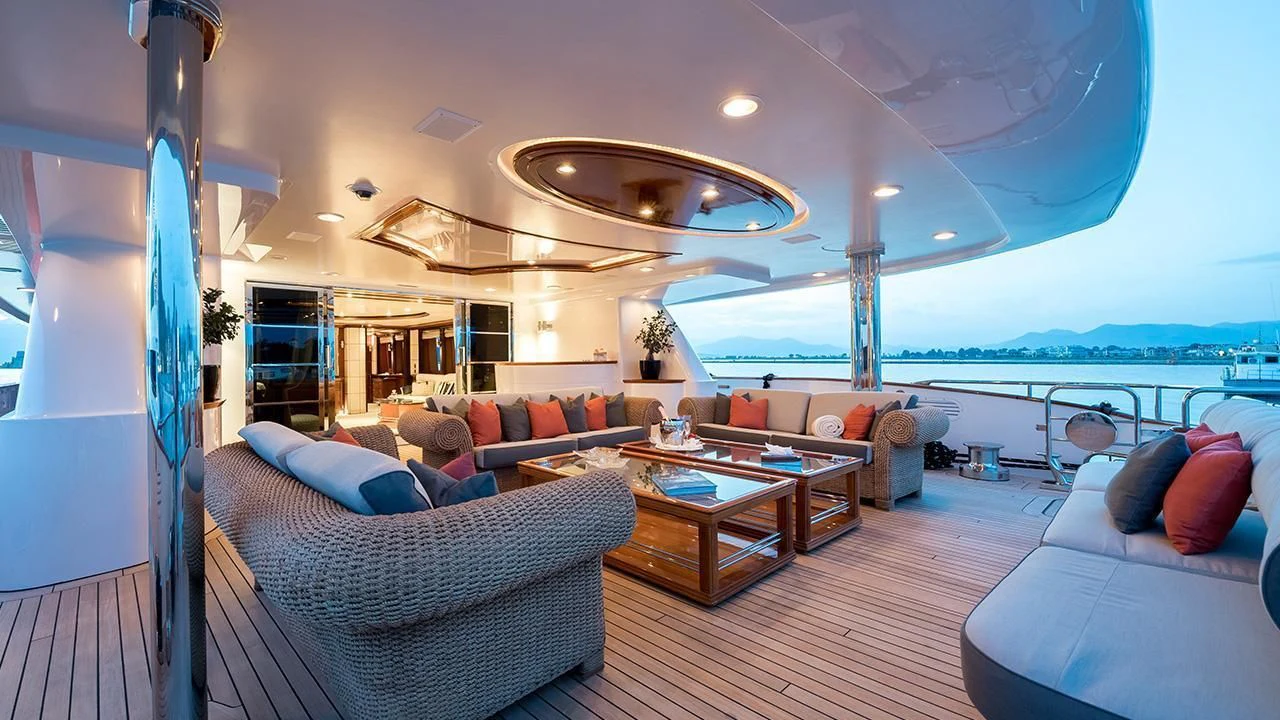 a living room with a large open window aboard TITIAN PEARL Yacht for Sale