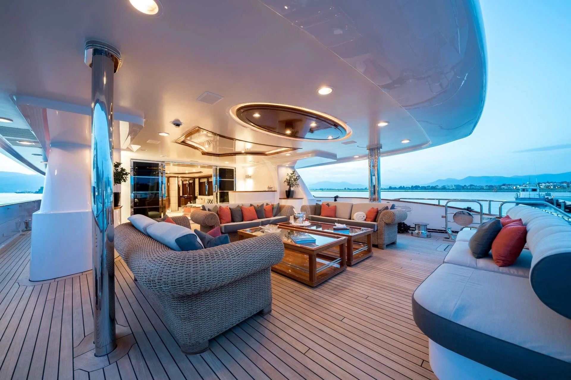 a living room with a large open roof aboard TITIAN PEARL Yacht for Sale