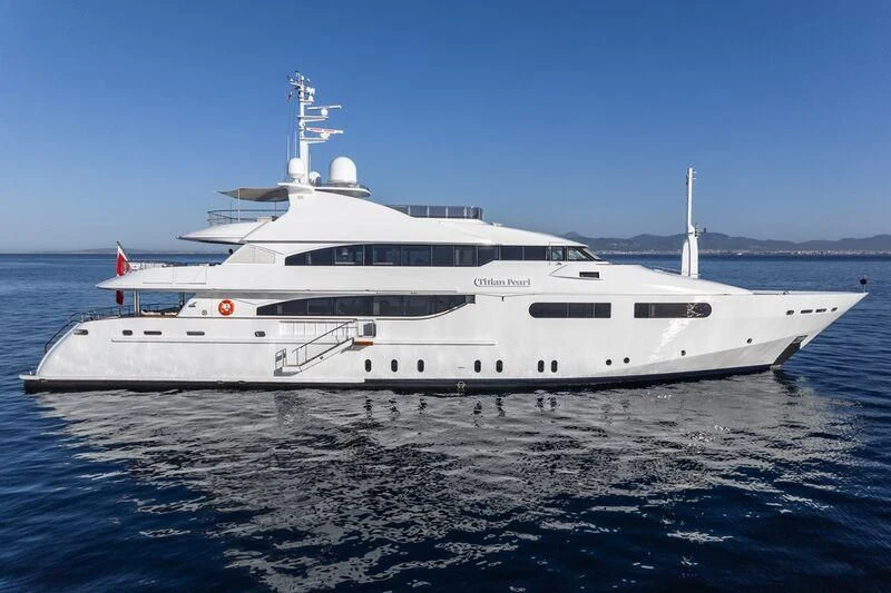 a large white yacht aboard TITIAN PEARL Yacht for Sale
