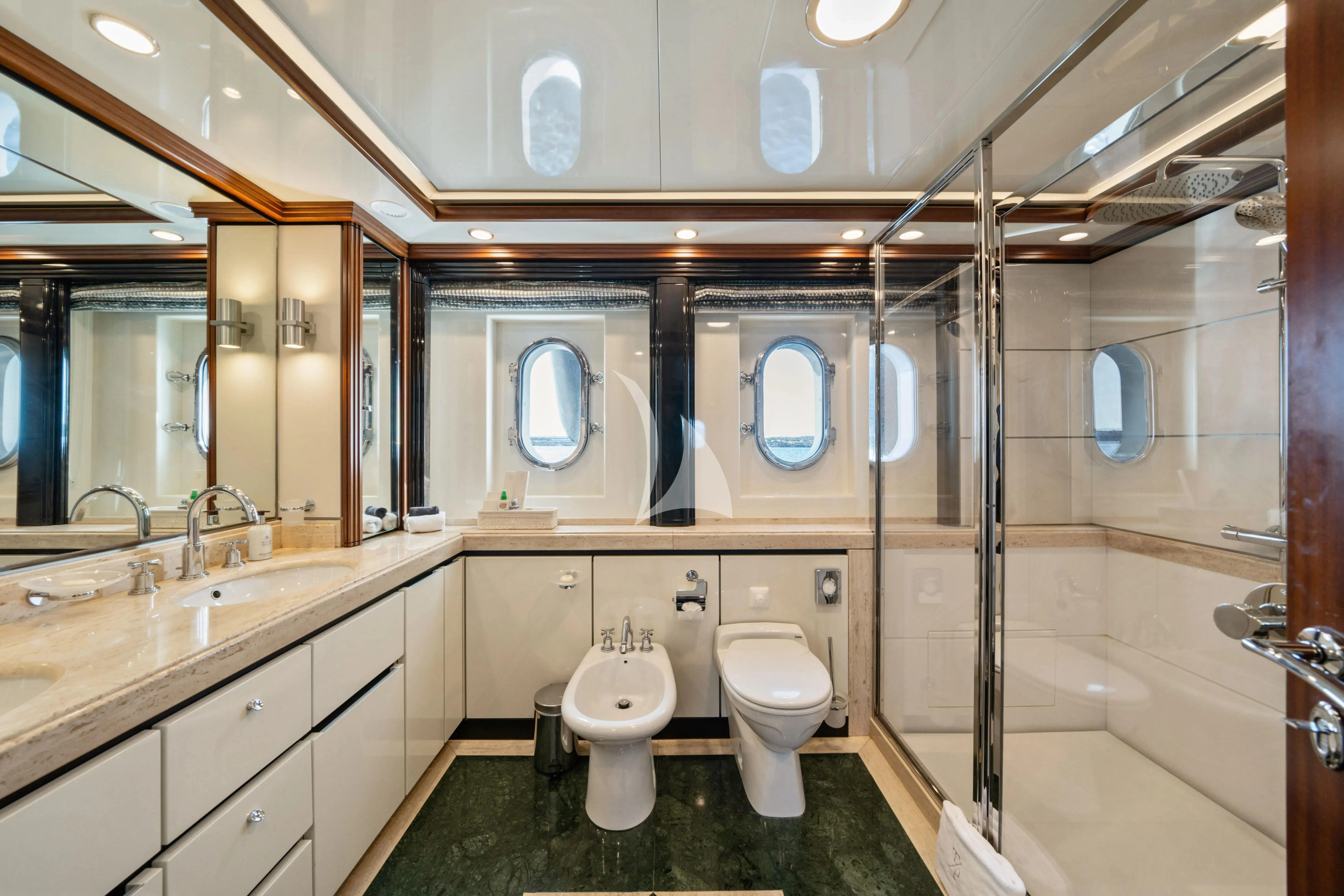 a bathroom with a toilet and sink aboard TITIAN PEARL Yacht for Sale