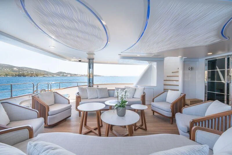 a large living room with a large body of water aboard TITIAN PEARL Yacht for Sale