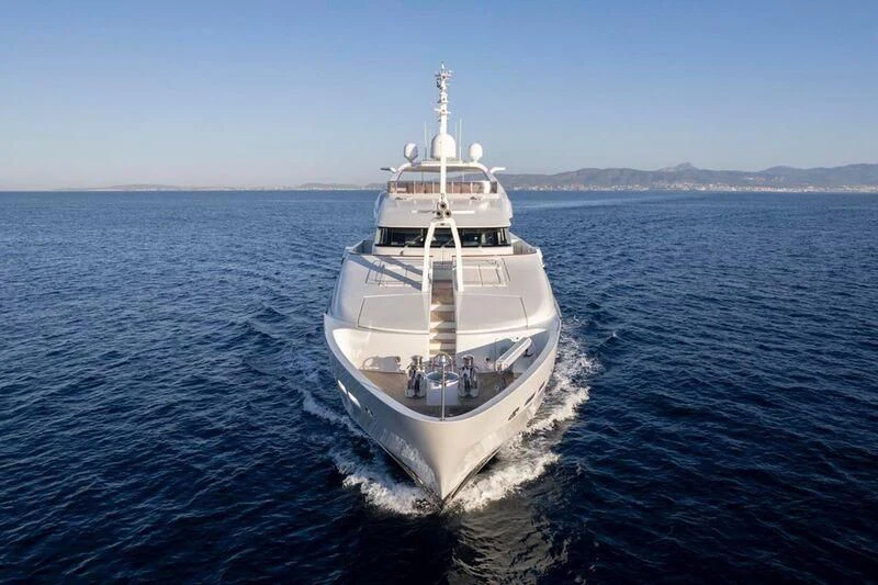 a large white ship in the water aboard TITIAN PEARL Yacht for Sale
