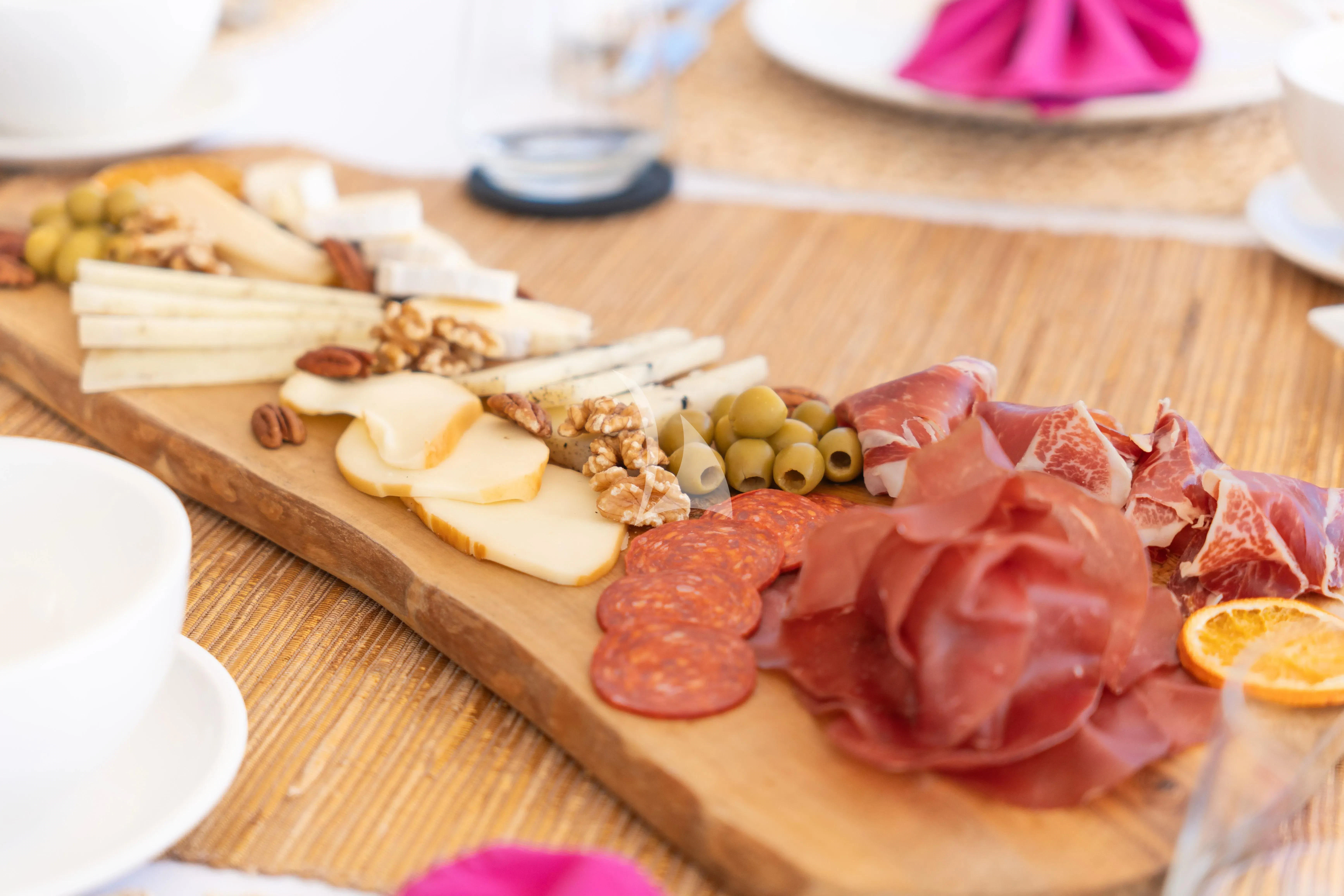 a cutting board with meat and vegetables aboard TITIAN PEARL Yacht for Sale