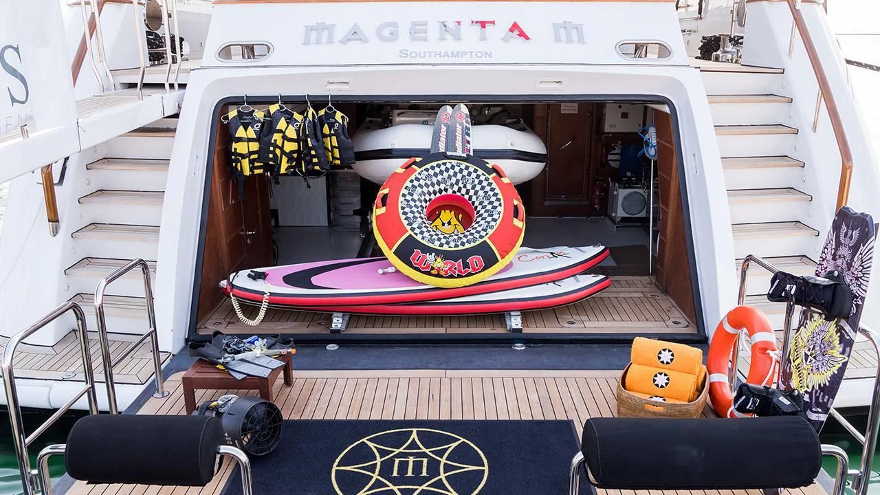 a white and red machine with a round object on the back aboard TITIAN PEARL Yacht for Sale