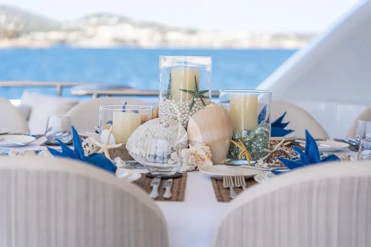 a table with food on it aboard TITIAN PEARL Yacht for Sale