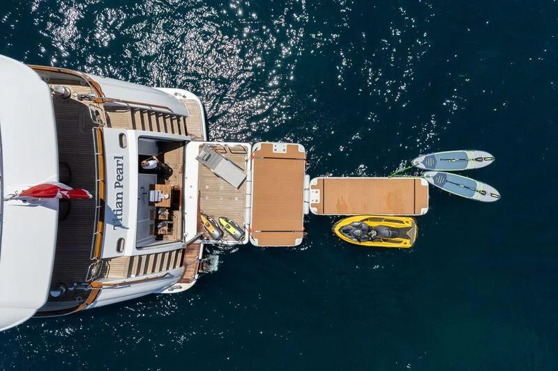 a boat in the water aboard TITIAN PEARL Yacht for Sale
