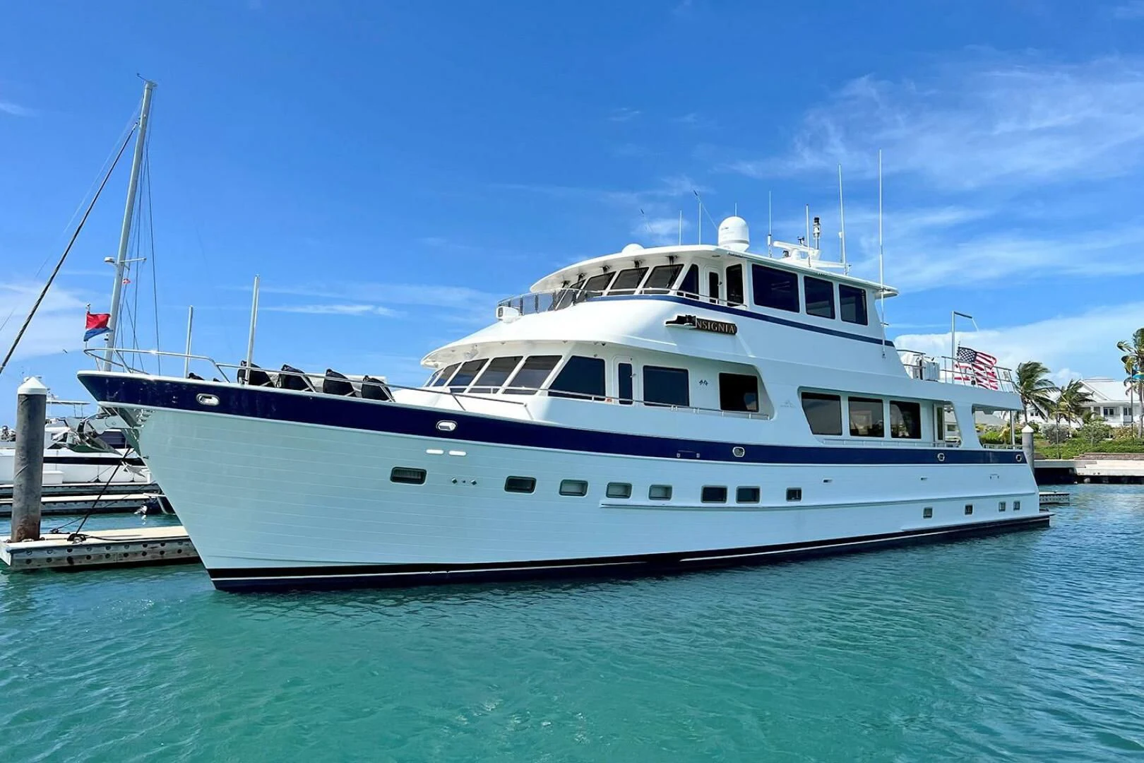 a large white boat aboard INSIGNIA Yacht for Sale