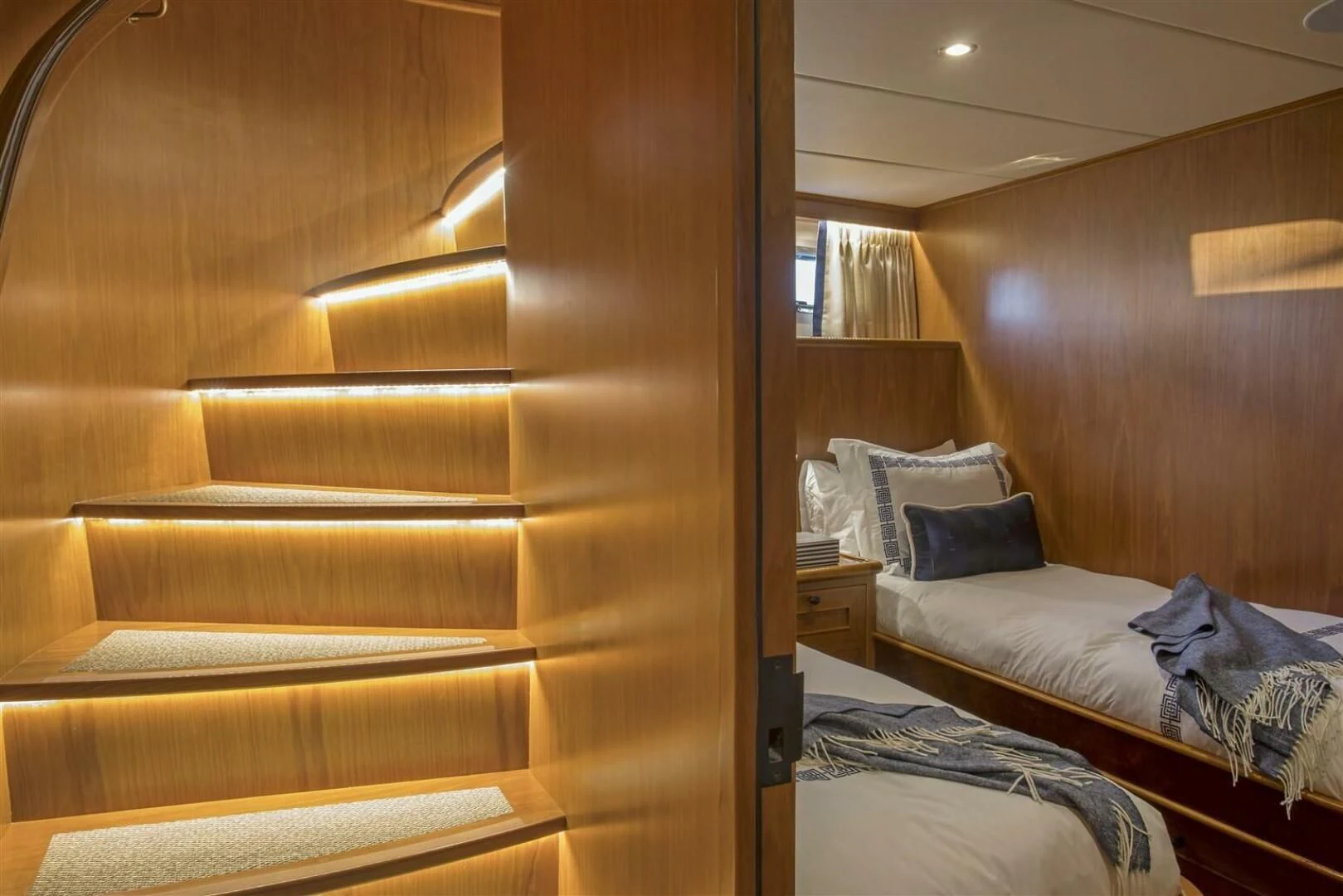 a bed in a room aboard INSIGNIA Yacht for Sale