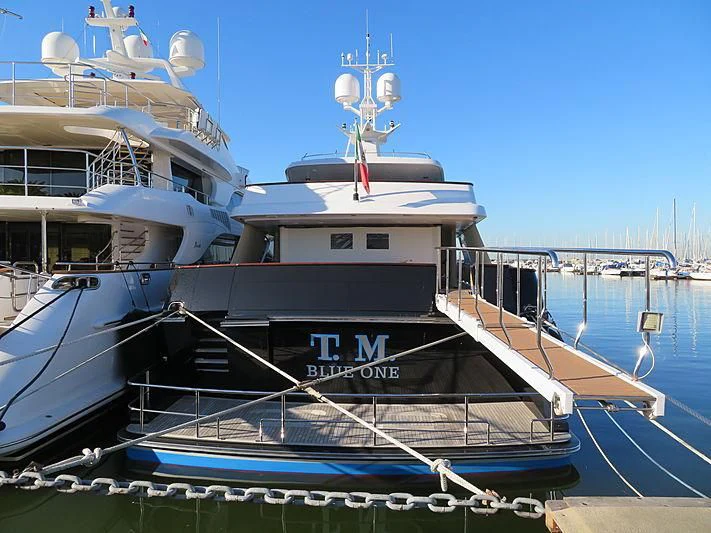 a couple of boats are parked in a dock aboard T.M. BLUE ONE Yacht for Sale