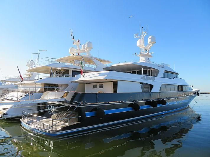 a couple of boats on the water aboard T.M. BLUE ONE Yacht for Sale