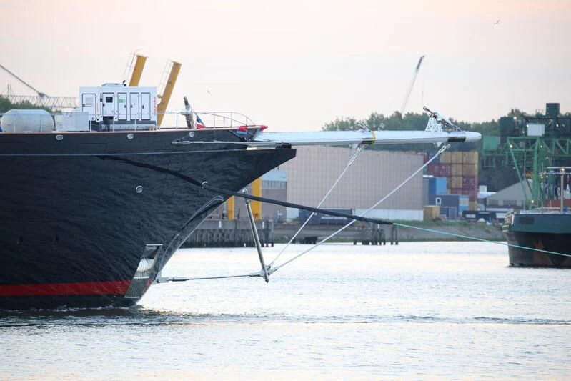 a large ship docked aboard KORU Yacht for Sale