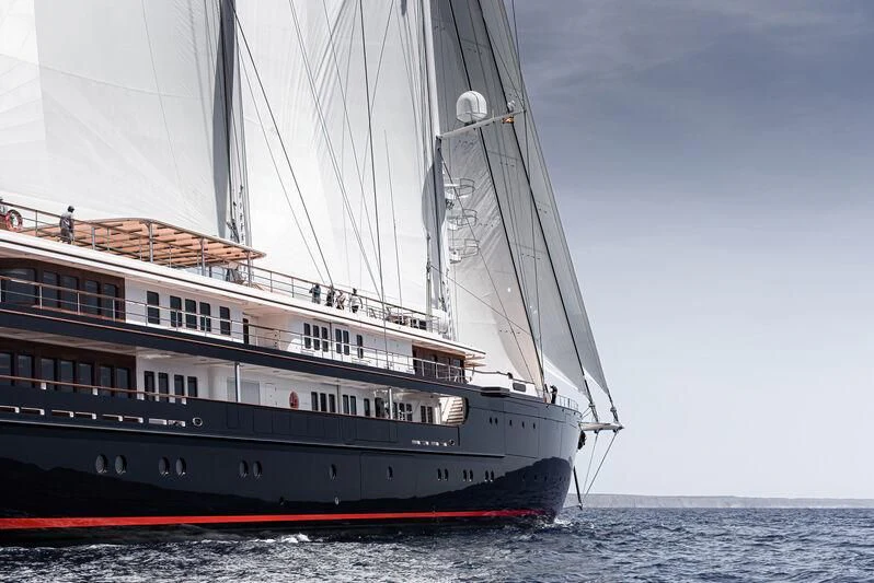 a large ship in the water aboard KORU Yacht for Sale