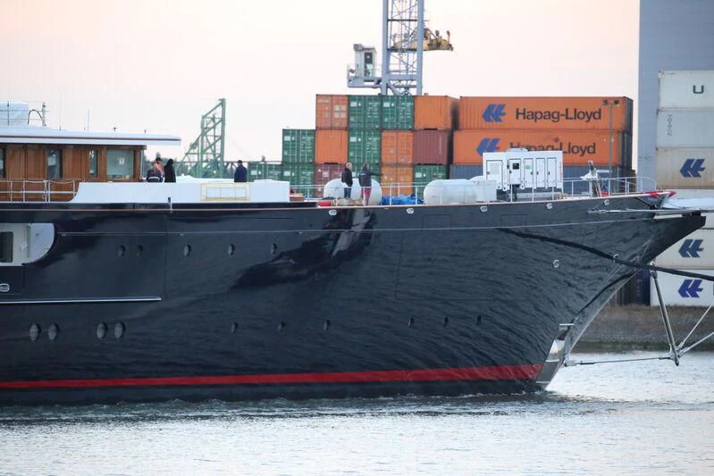 a large ship docked aboard KORU Yacht for Sale