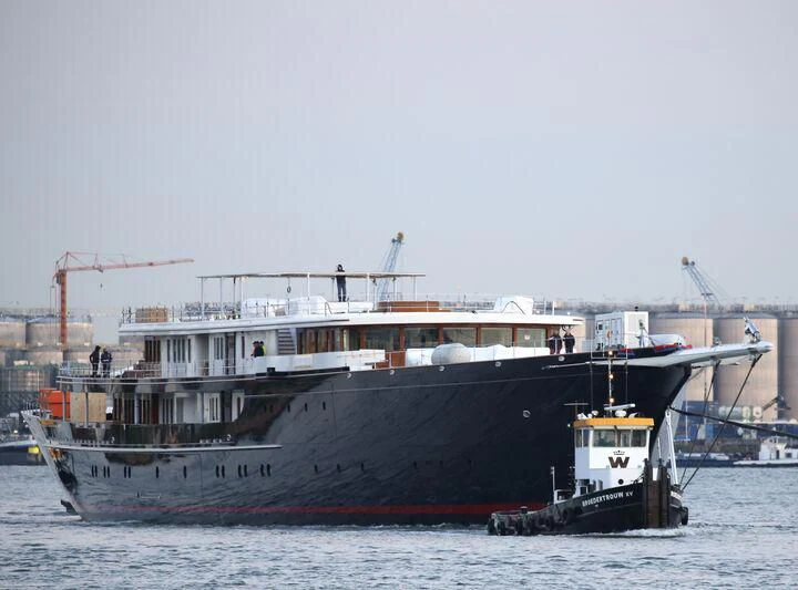 a large boat in the water aboard KORU Yacht for Sale