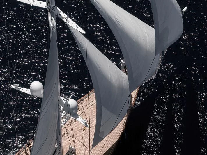 a large flag with a flag aboard KORU Yacht for Sale