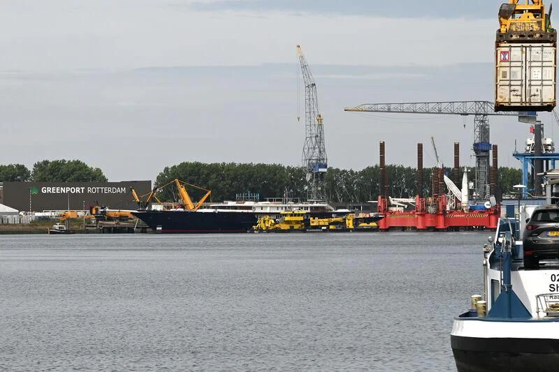 a large ship in the water aboard KORU Yacht for Sale