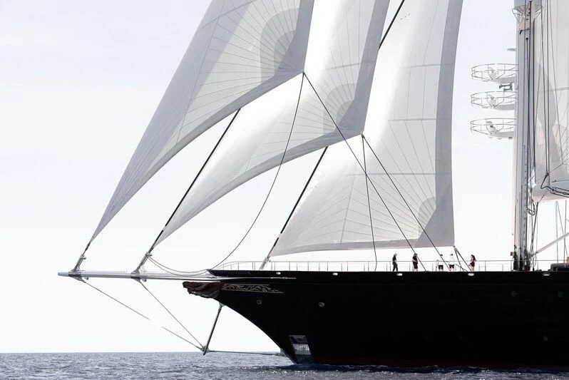 a large sailboat on the water aboard KORU Yacht for Sale