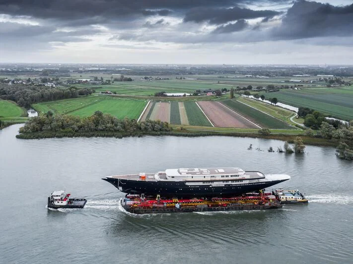 a large ship sailing on water aboard KORU Yacht for Sale