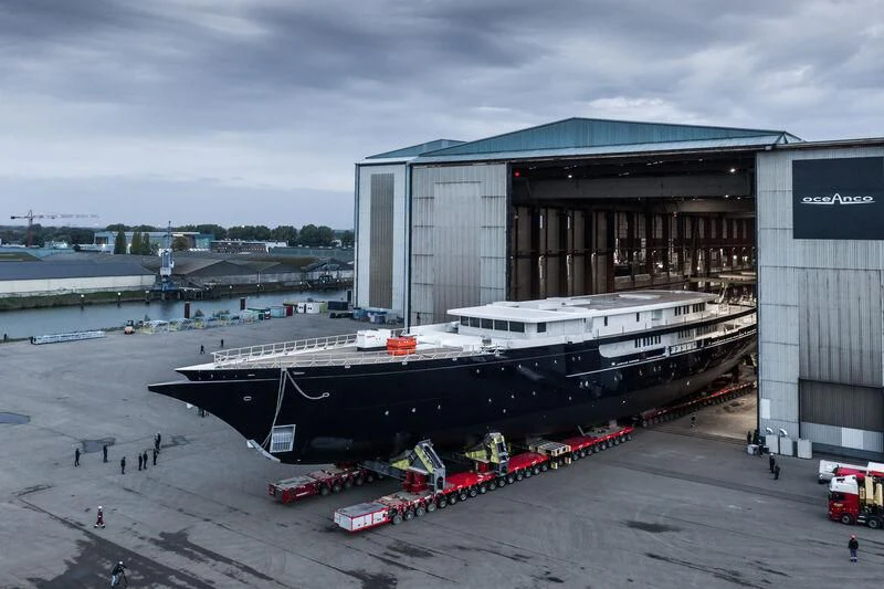 a large black and white ship aboard KORU Yacht for Sale