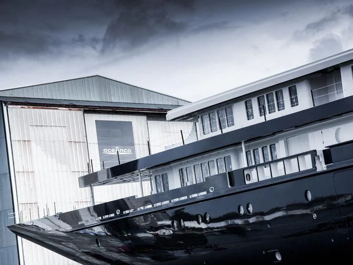 a building with a large glass window aboard KORU Yacht for Sale