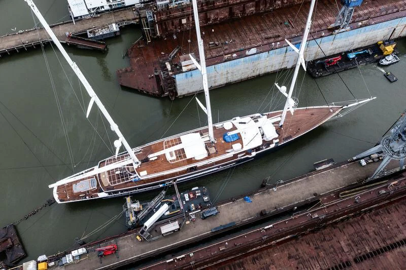 a large ship docked aboard KORU Yacht for Sale