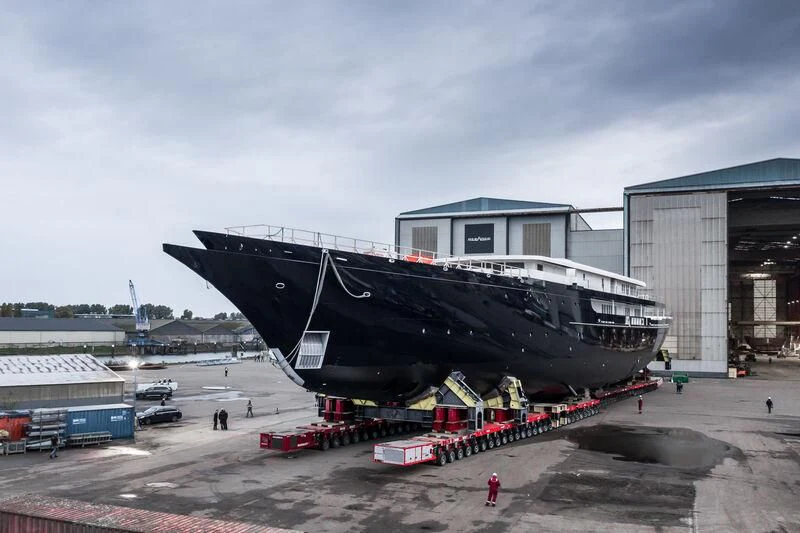 a large black object with a red stripe on the front aboard KORU Yacht for Sale