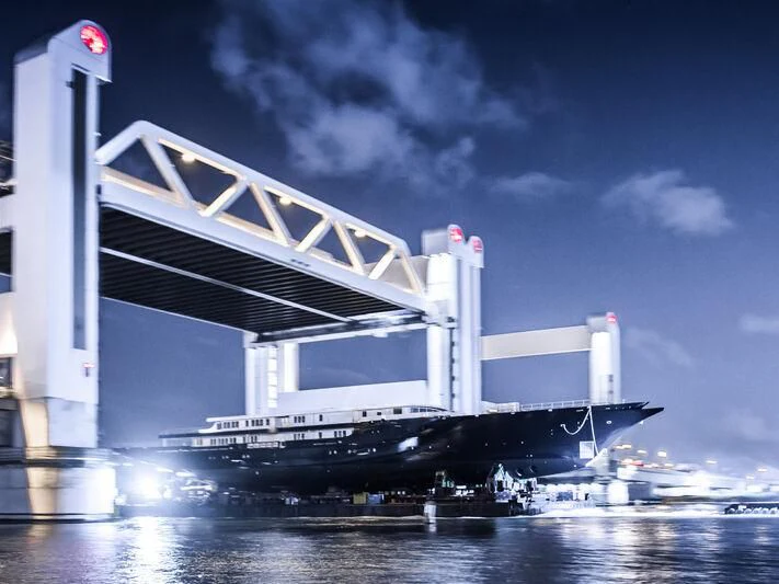 a large building with a bridge aboard KORU Yacht for Sale