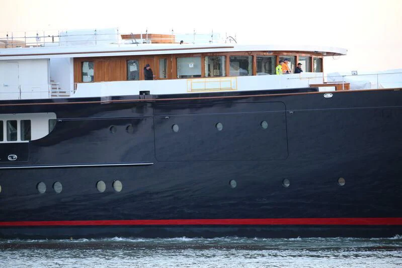 a large boat on the water aboard KORU Yacht for Sale