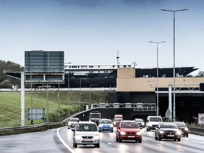 cars on a highway aboard KORU Yacht for Sale