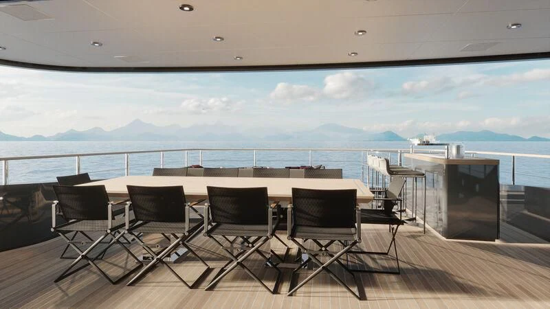 a deck with chairs and a view of the ocean aboard PARA BELLVM Yacht for Charter