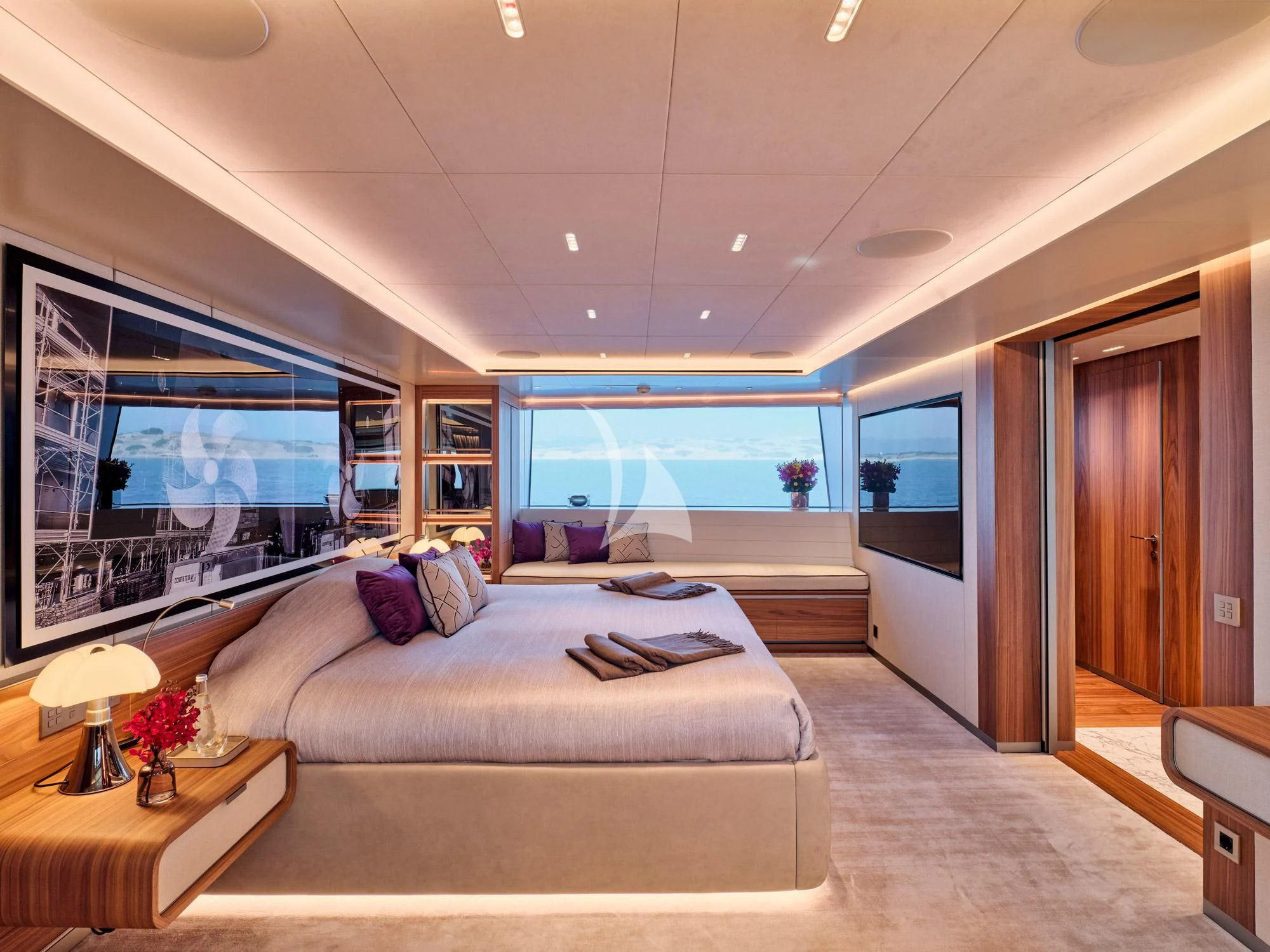 a large bed in a room aboard PARA BELLVM Yacht for Charter