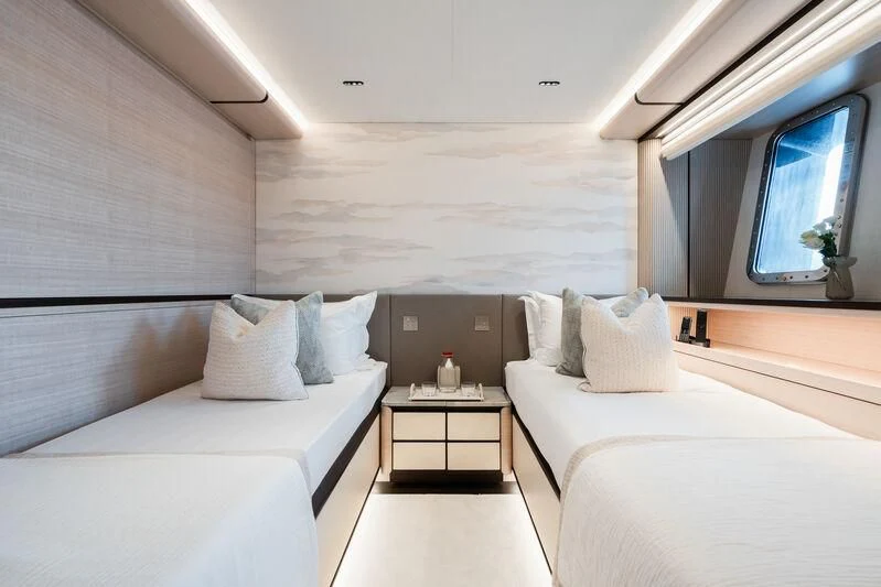 a room with two beds aboard PARA BELLVM Yacht for Charter