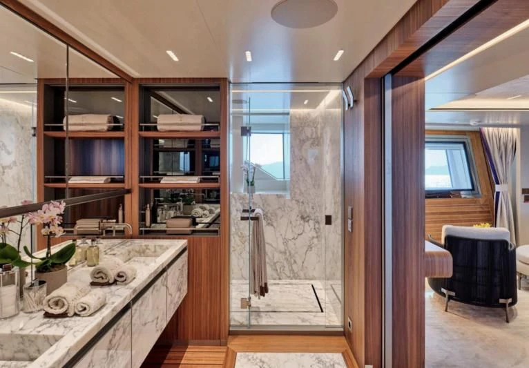 a room with a table and chairs aboard PARA BELLVM Yacht for Charter