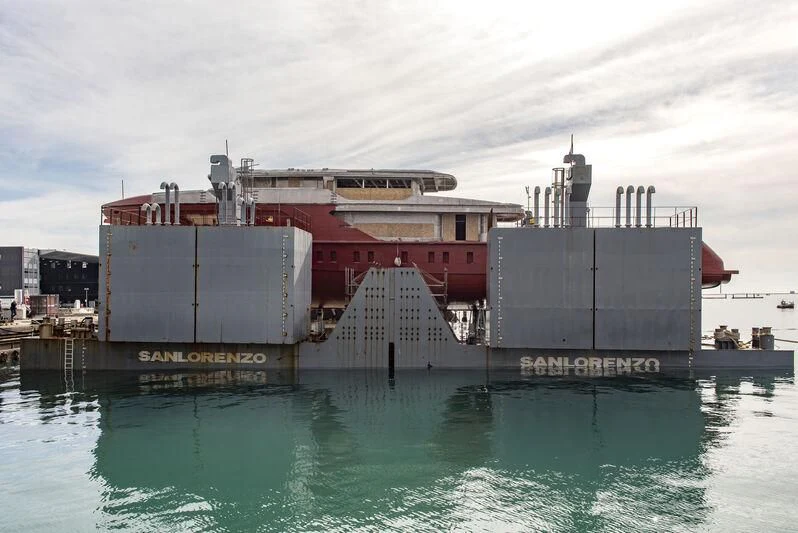 a large building with a water fountain aboard PARA BELLVM Yacht for Charter