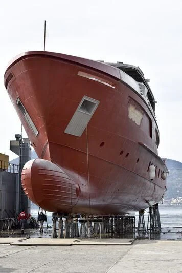 a large red and white space ship aboard PARA BELLVM Yacht for Charter