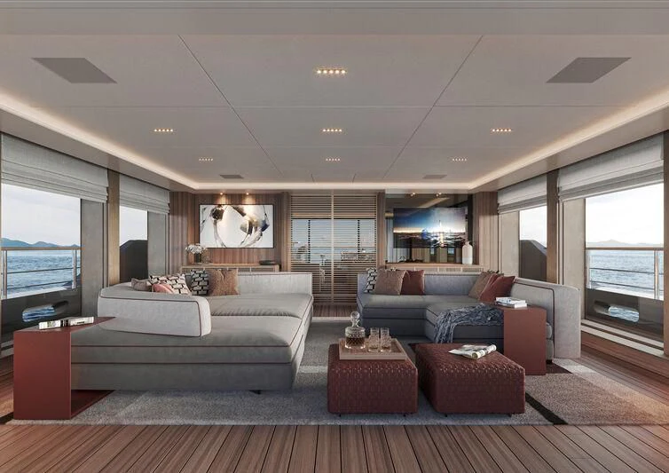 a living room with a couch and a coffee table aboard PARA BELLVM Yacht for Charter