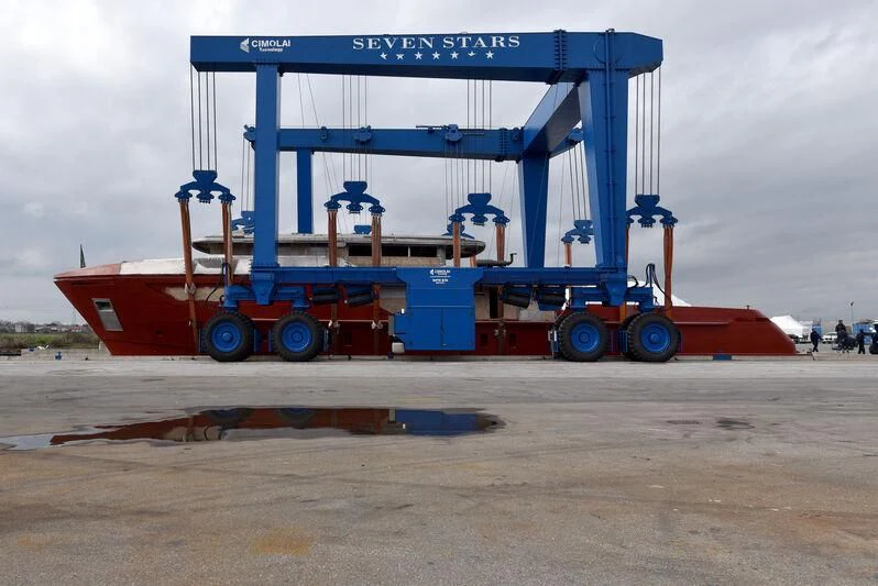 a red and blue machine on a beach aboard PARA BELLVM Yacht for Charter