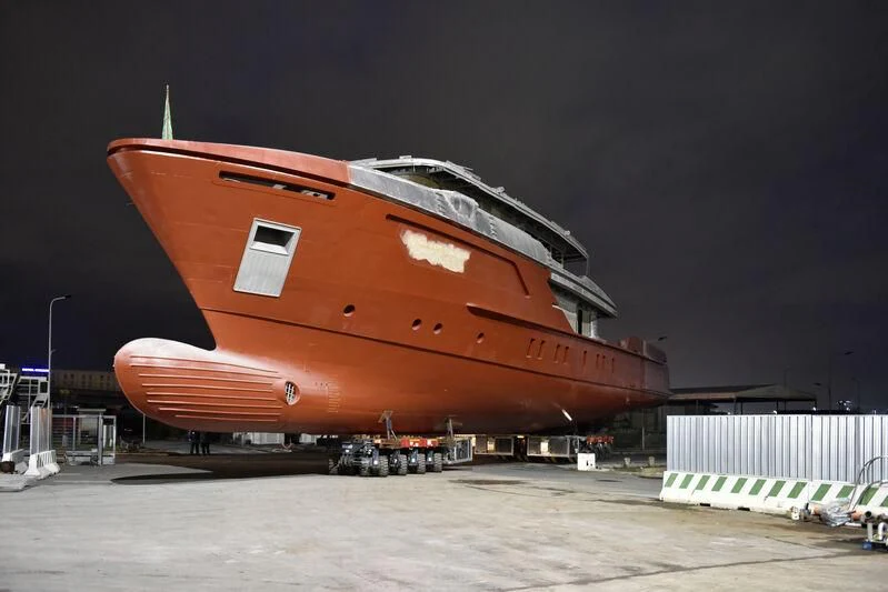 a large red and white space ship aboard PARA BELLVM Yacht for Charter