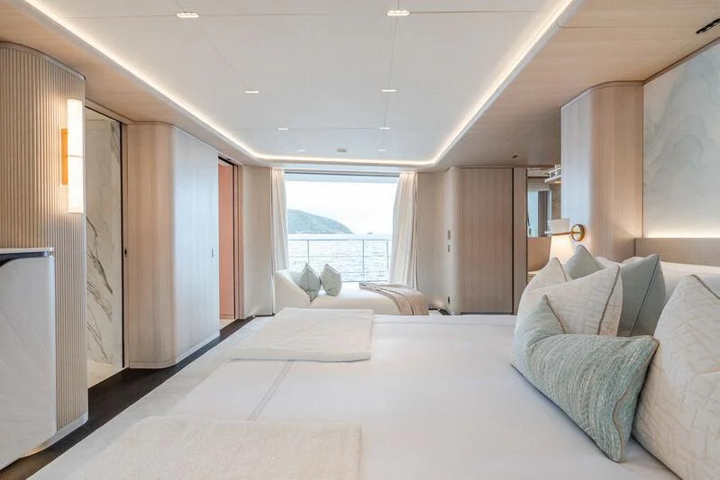a large bed in a room aboard PARA BELLVM Yacht for Charter