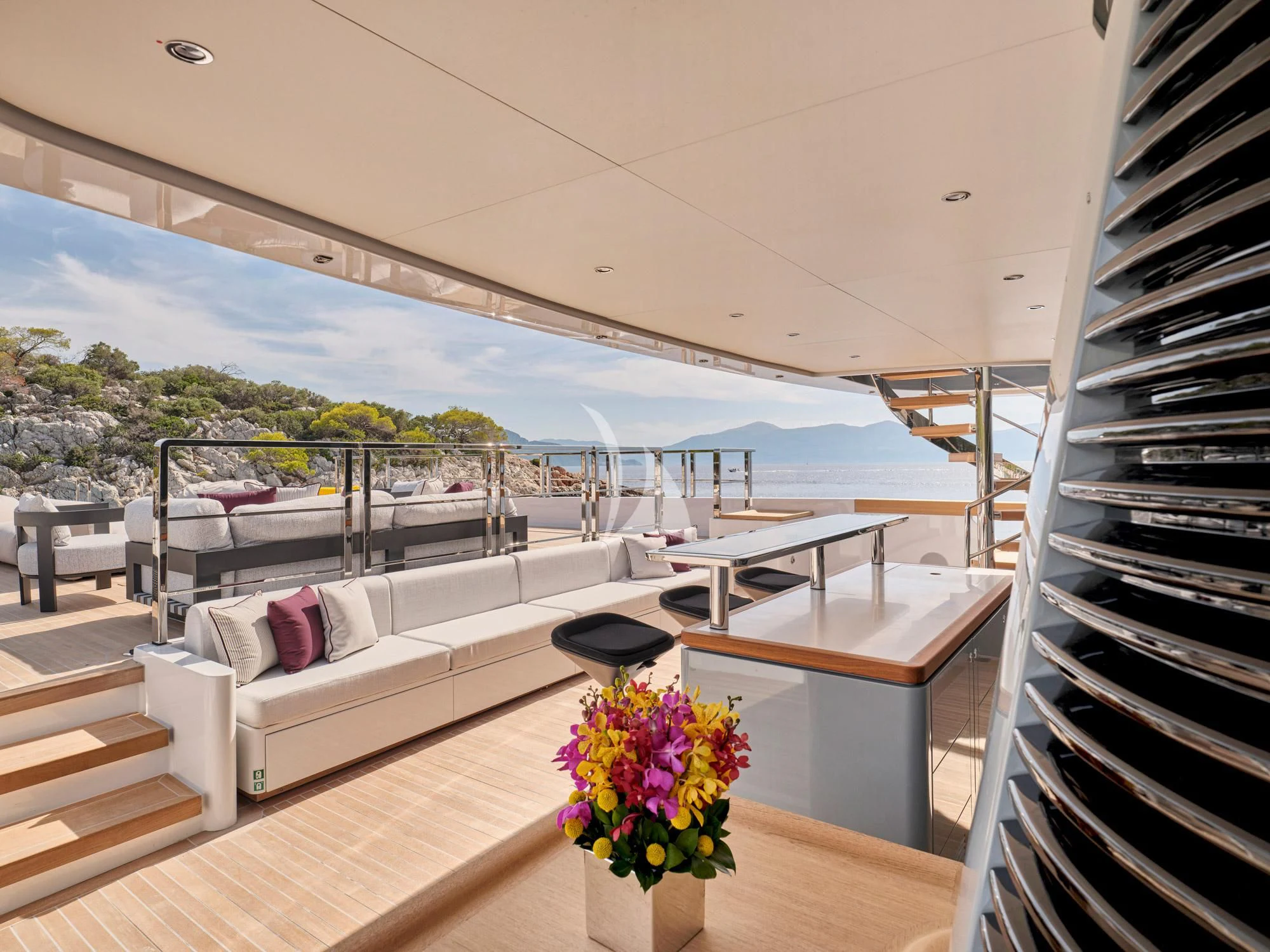 a balcony overlooking a city aboard PARA BELLVM Yacht for Charter