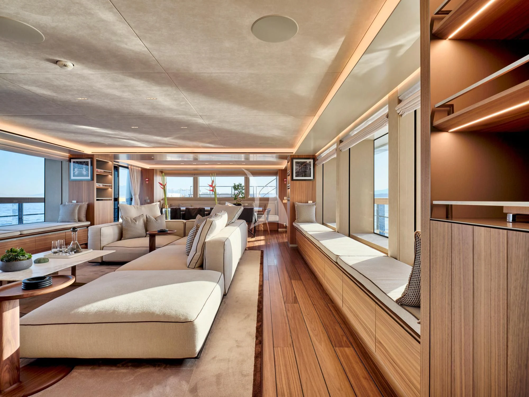 a room with a couch and a table aboard PARA BELLVM Yacht for Charter