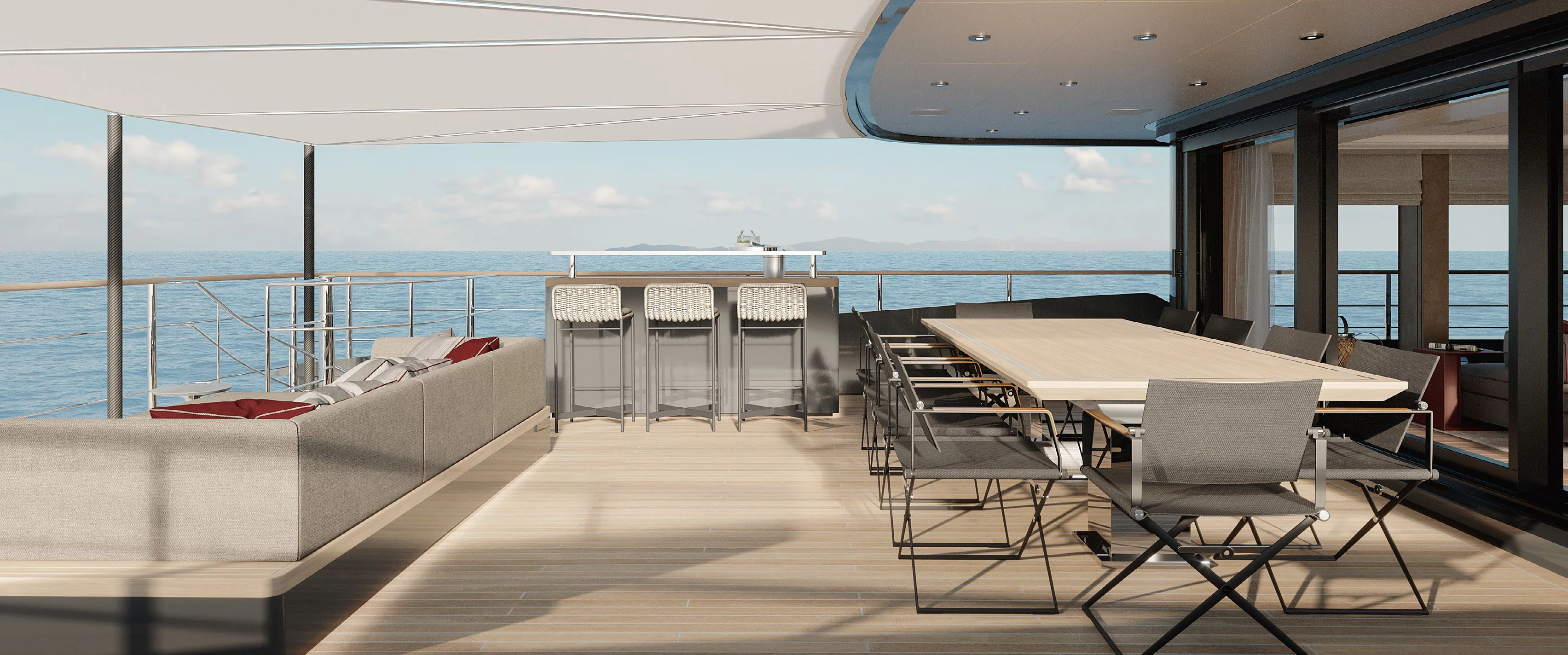 a room with a table chairs and a large body of water aboard PARA BELLVM Yacht for Charter