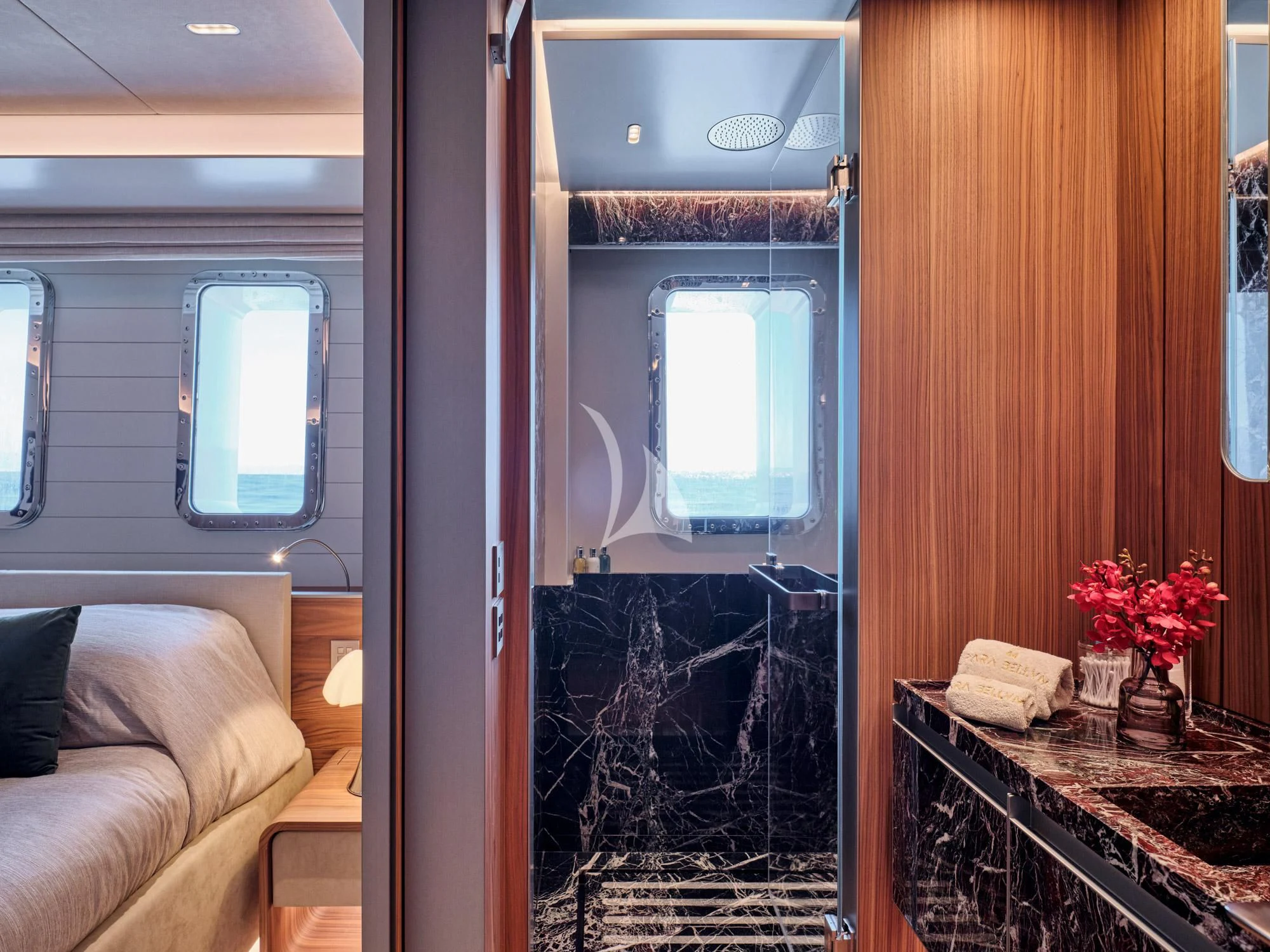 a room with a fireplace and a table aboard PARA BELLVM Yacht for Charter