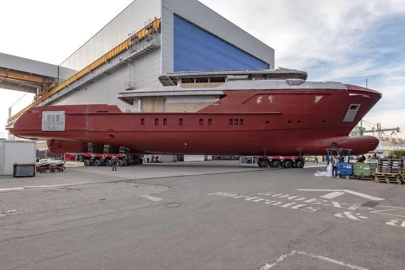 a large red and white building aboard PARA BELLVM Yacht for Charter