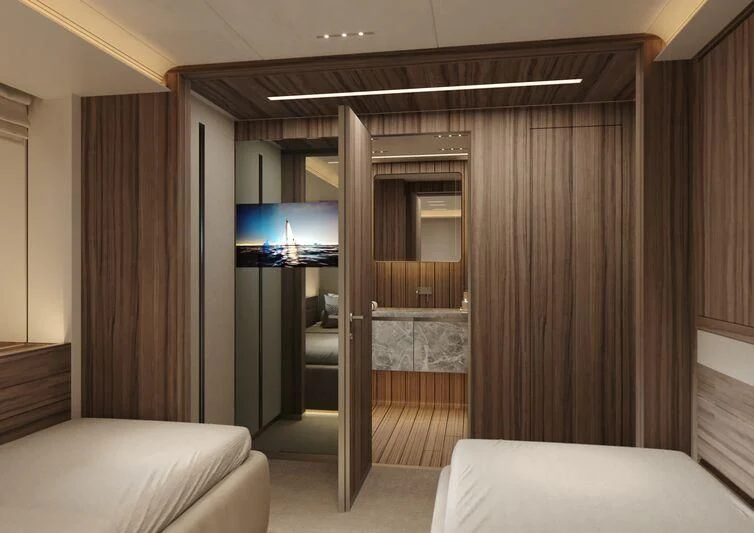 a room with a bed and a television aboard PARA BELLVM Yacht for Charter